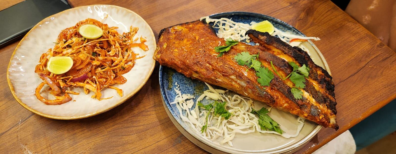 Fish fry served with spicy onion salad